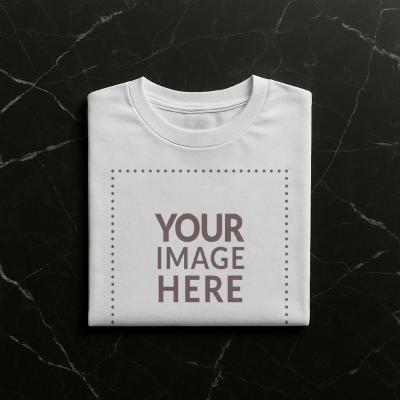 Folded T-Shirt Mockup on Dark Surface Top View
