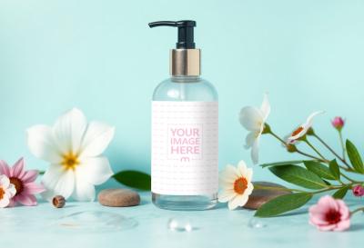 Cosmetic Bottle Label Mockup with Flowers in Background