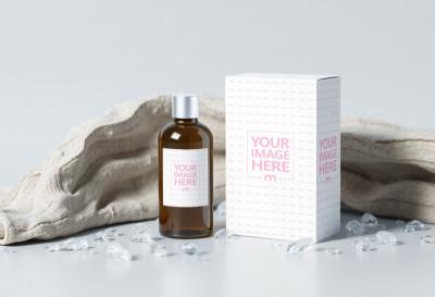 Bottle Label and Box Mockup with Ice and Fabrics