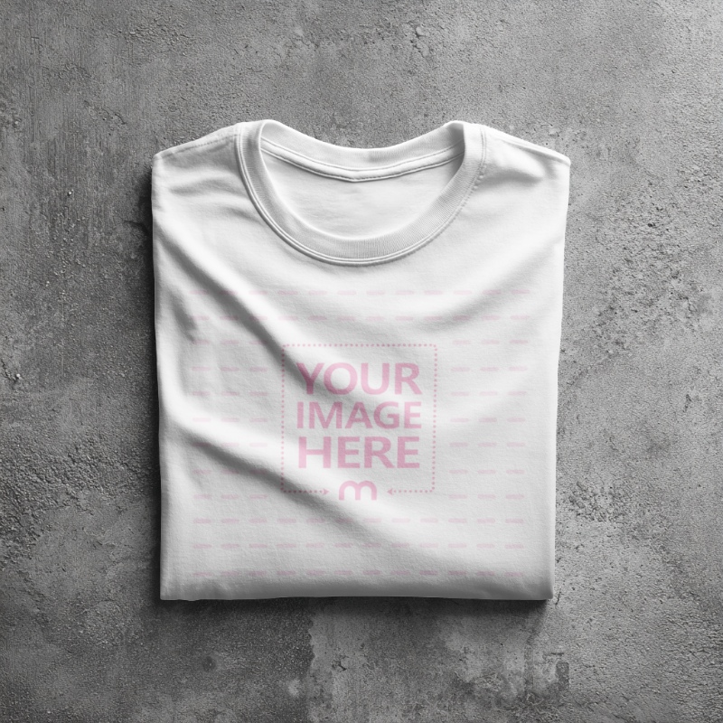 Folded Shirt Mockup on Concrete Floor Top View preview image