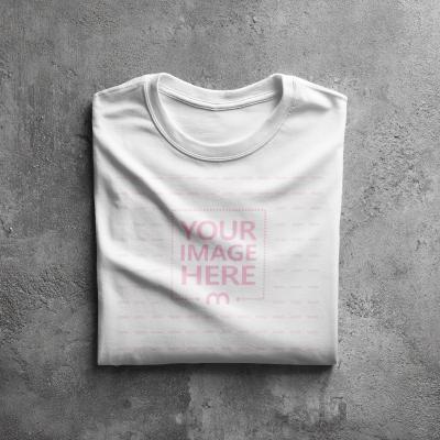 Folded Shirt Mockup on Concrete Floor Top View