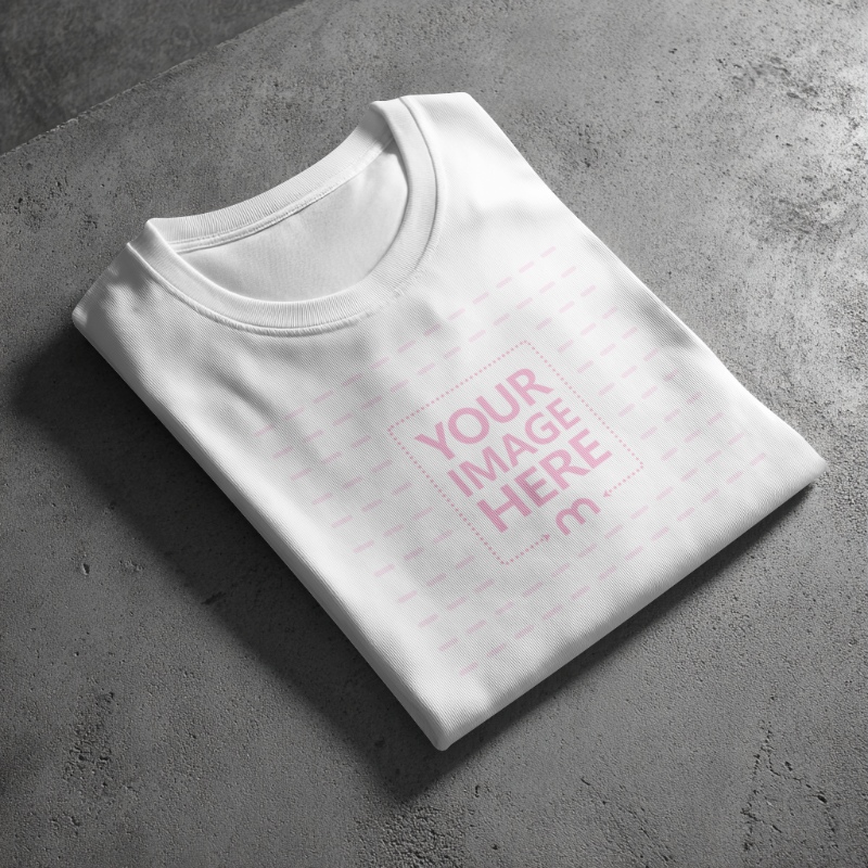 Diagonal Folded Shirt PSD Mockup on Concrete Floor preview image