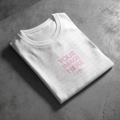 Diagonal Folded Shirt PSD Mockup on Concrete Floor