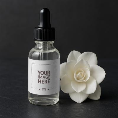 Dropper Bottle Label Mockup with Roses for Beauty Brands