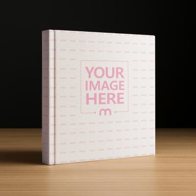 Square Book Cover Mockup on Wooden Floor on Dark Background