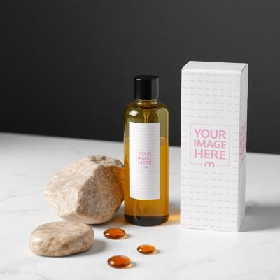 Bottle Label and Box Mockup with Liquid Drops and Dark Setting