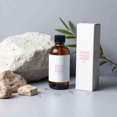 Amber Bottle Label and Box Mockup with Rocks on White Floor