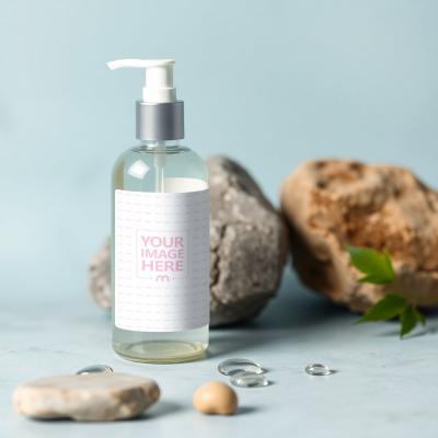 Perfume Bottle Label Mockup with Rock on Light Blue Background