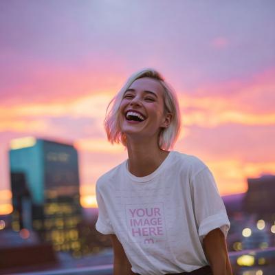 T-Shirt Mockup with Woman Laughing at Golden Hour City View