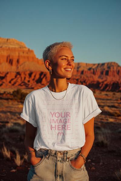 T-Shirt Mockup with Woman Posing on Hilltop Outdoor Scene