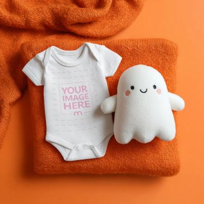 Baby Bodysuit Mockup on Knit Fabric with Ghost Doll for Halloween Themed Look
