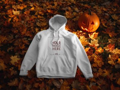 Hoodie Mockup Top View on Halloween Themed Background