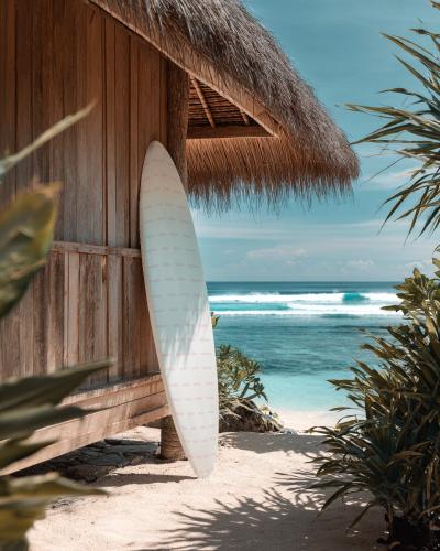 Surfboard Mockup Outside Wooden House with Beach View