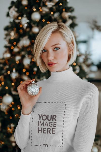 Sweatshirt Mockup on Female in Christmas Decor for Seasonal Branding