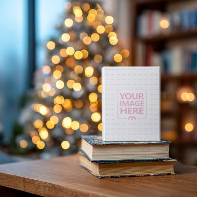 Book Cover Mockup on Stacked Books with Christmas Background
