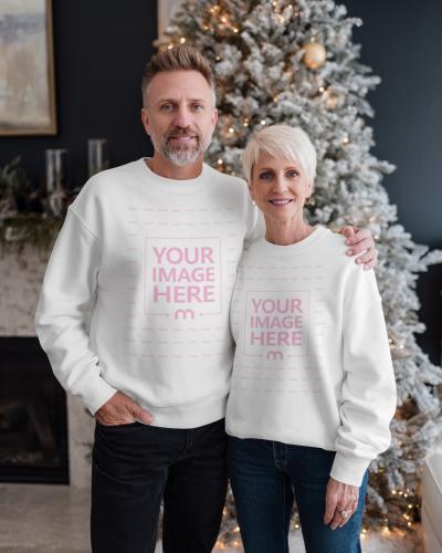 Elderly Couple Sweatshirt Mockup in Christmas Decor Setting