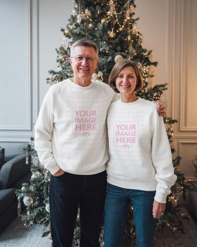 Sweatshirt Mockup with Elderly Couple in Cozy Living Room