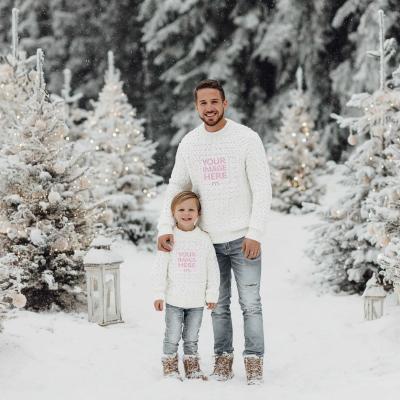 Sweatshirt Mockup with Dad and Son in Outdoor Christmas Snow