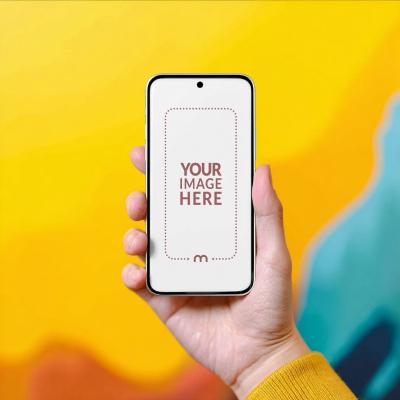 Smartphone Mockup Generator in Hand with Multicolored Wall Behind