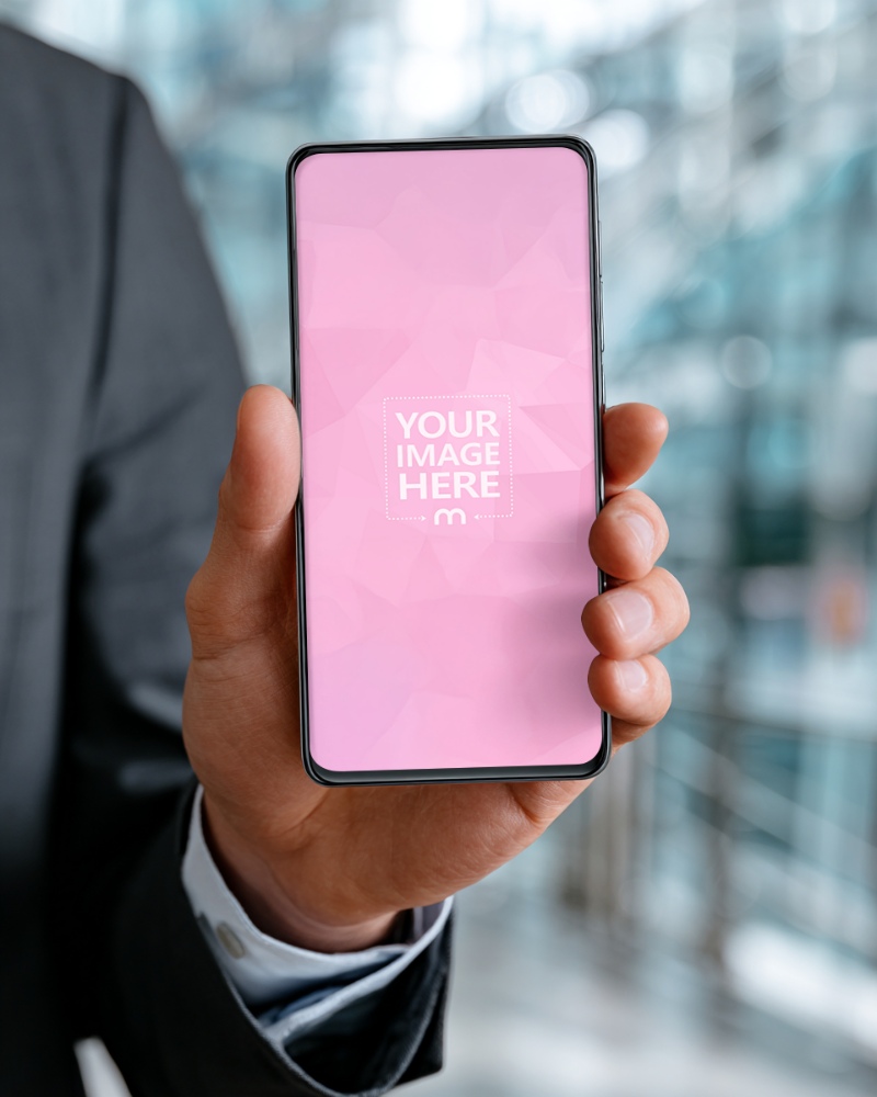 Smartphone Mockup with Man in Suit in Modern Business Setting preview image