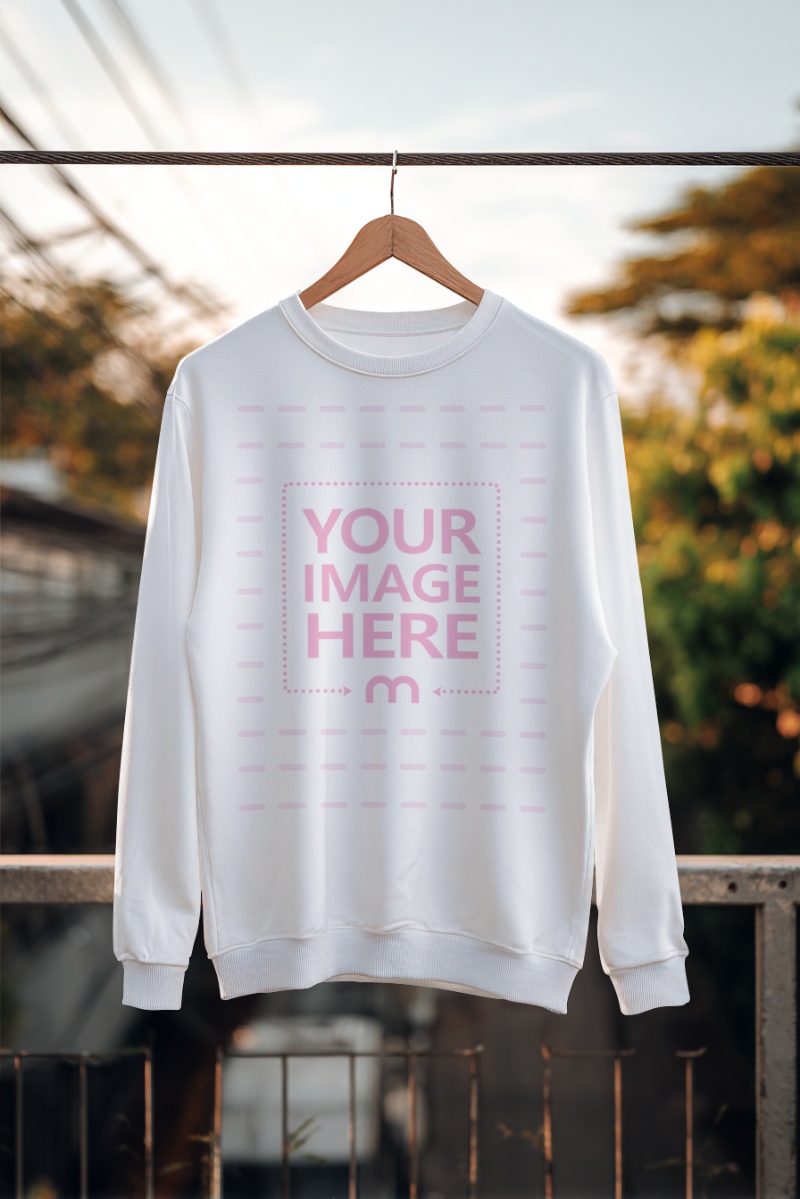 Sweatshirt Mockup Hanging on Steel Cable with Outdoor Scene preview image