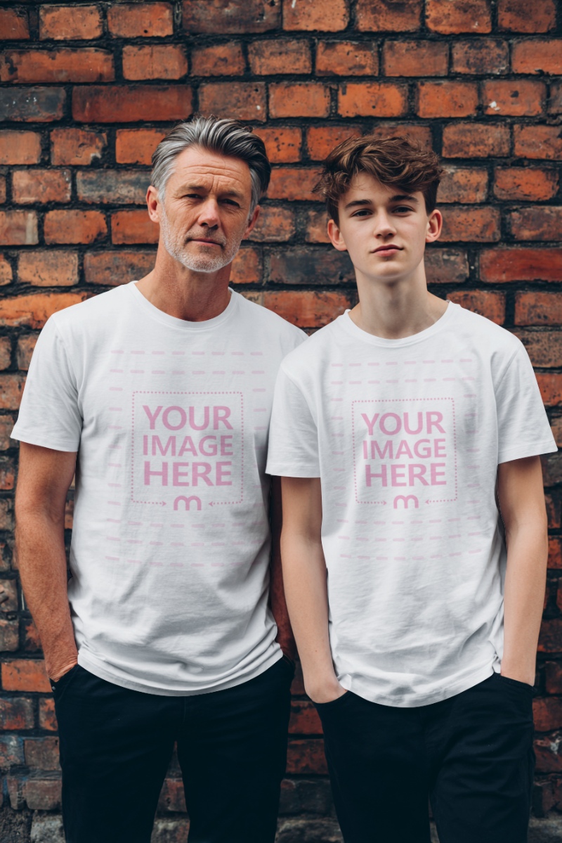 T-Shirt Mockup with Father and Son y in Front of Orange Brick Wall preview image