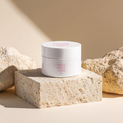 Cream Bottle Mockup on Limestone Podium