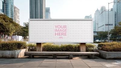 Billboard Mockup in Park with City Buildings Behind