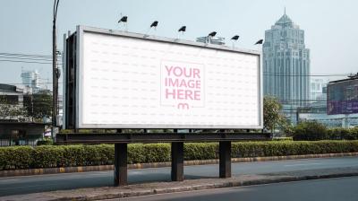 Roadside Billboard Mockup in Park Setting with Urban City Background