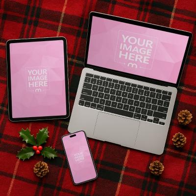iPhone, Laptop and Tablet Mockup on Red Cloth with Tree and Holiday Décor