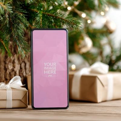 Smartphone Screen Mockup with Christmas Gift Boxes in Festive Flatlay