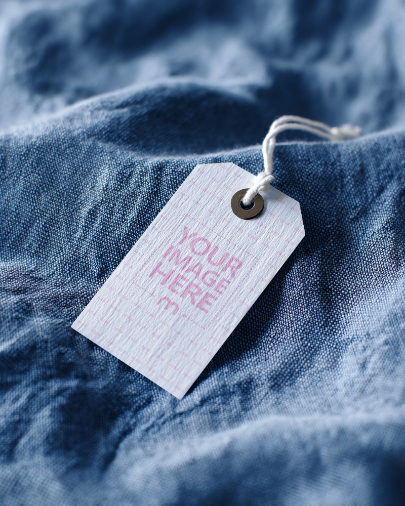 Cloth Tag Mockup on Blue Jeans Fabric with Detail View preview image