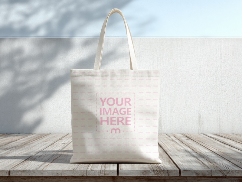 Tote Bag Mockup on White Wooden Table in Minimal Scene preview image