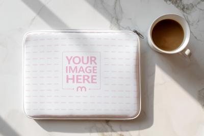 Laptop Bag on Marble Floor Top View with Cup of Tea
