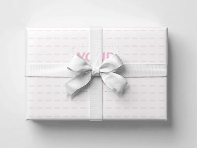 Top View of Gift Box Mockup with White Ribbon on White Background