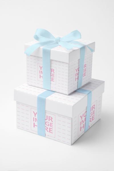 Stacked Gift Box Mockup with White Ribbons in Minimal Studio Scene