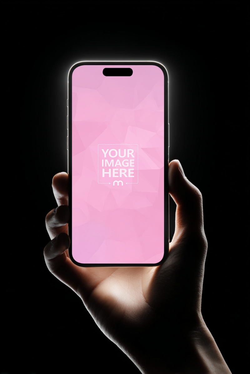 Glowing Smartphone Mockup Held in Hand in Dark Background - Mediamodifier