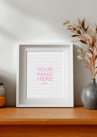 Frame Mockup on Wooden Shelf for Family Photos