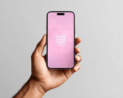 Smartphone Mockup in Hand Placed on Studio Background