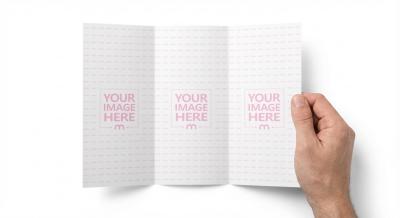 Trifold Brochure Mockup Held in Hand on Clean Studio Background