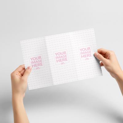 Trifold Brochure Mockup Held with Both Hands on Neutral Background