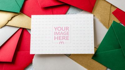 Card Mockup in Flat Lay Centered on Layered Colored Paper