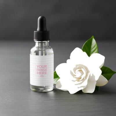 Essential Oil Bottle Mockup Placed on Botanical Background