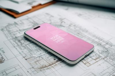 Smartphone Mockup Resting on Technical Blueprints