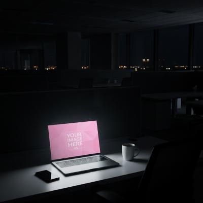 Laptop Mockup Generator in Dark Office at Night