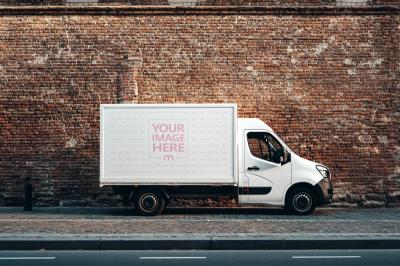 Delivery Van Mockup with Urban Brick Wall Background