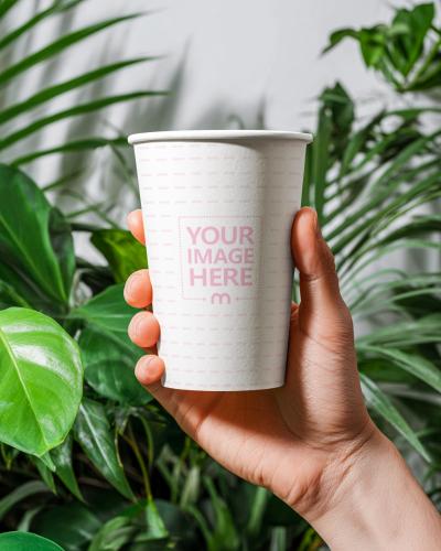 Paper Cup Mockup Held in Hand for Eco-Friendly Coffee Branding