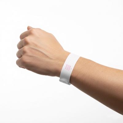 Paper Wristband Mockup on Wrist for Wearable Branding
