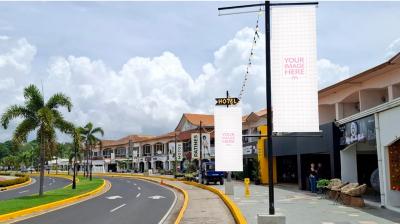 Banner Mockup on Roadside Pole for Outdoor Advertising