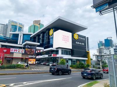 Billboard Mockup on Roadside Building Wall